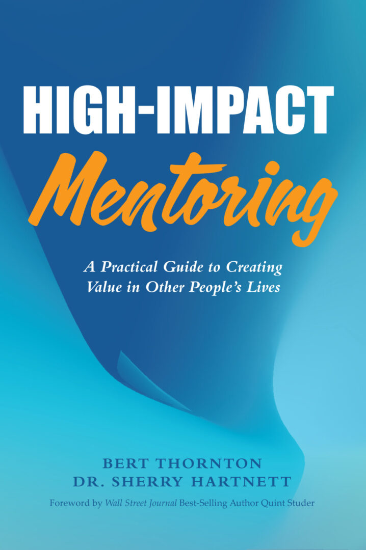 A book cover with the title of high-impact mentoring.