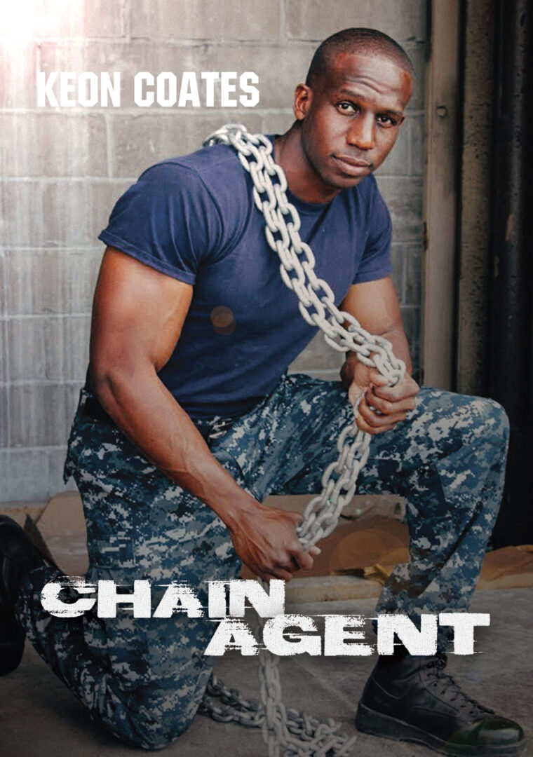 A man in blue shirt and camouflage pants holding chains.