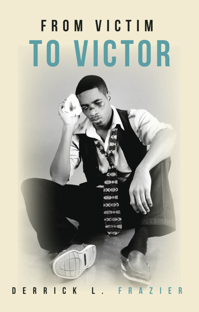 Book cover featuring a man sitting down with one hand to his forehead, titled "From Victim to Victor" by Derrick L. Frazier.