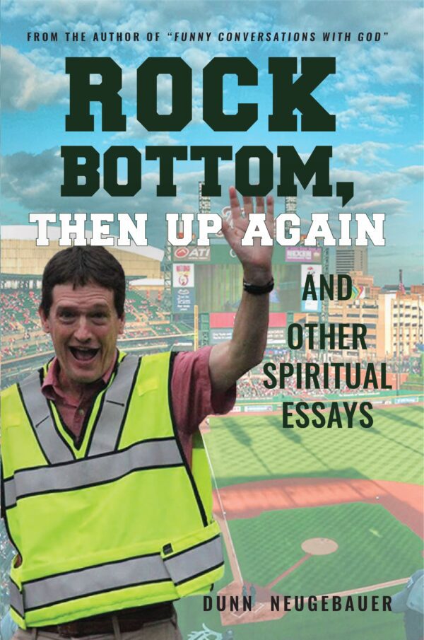 Man in a hi-vis vest cheering in front of a baseball stadium backdrop, with overlay text for the book "Rock Bottom, Then Up Again and Other Spiritual Essays".