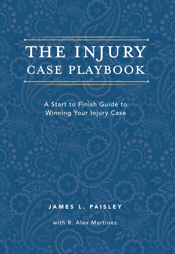 Cover of "The Injury Case Playbook" by James L. Paisley with R. Alex Martinez, a guide to winning injury cases with blue floral background design.