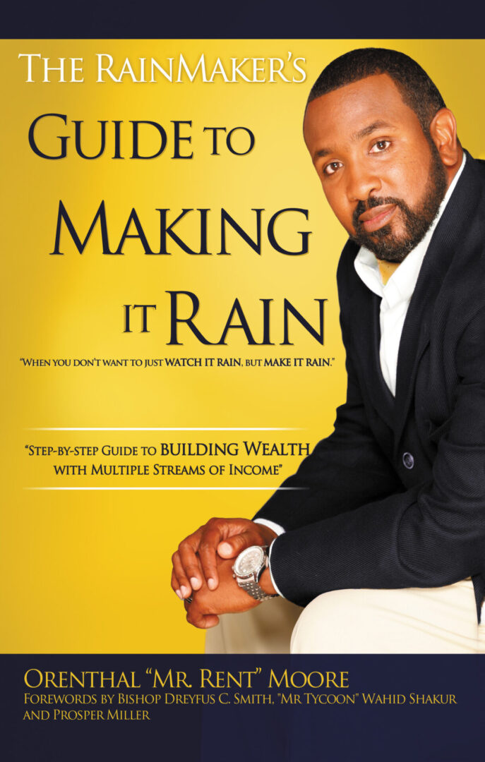 A man in a suit posing on the cover of The Rainmaker's Guide to Making It Rain!