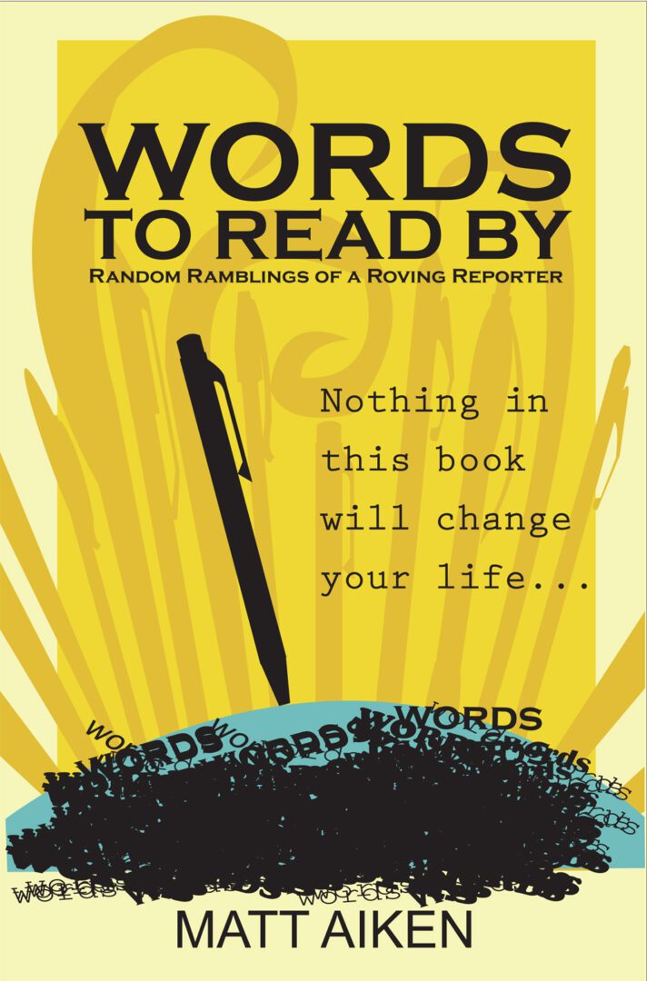 Book cover featuring the title "Words to Read By," a stylized pen, and the author's name, Matt Aitken.