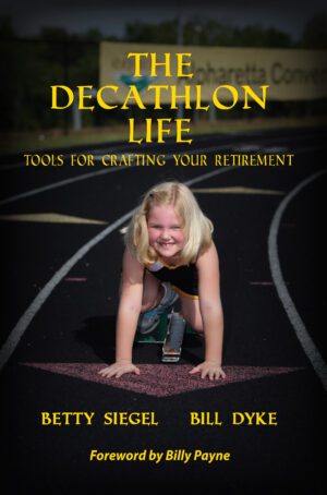 A book cover titled "The Decathlon Life: Tools for Crafting Your Retirement" featuring a young girl in a starting position on a track, with the subtitles "tools for crafting your retirement" and the authors' names, Betty Siegel and Bill Dyke, with a foreword by Billy Dyke.