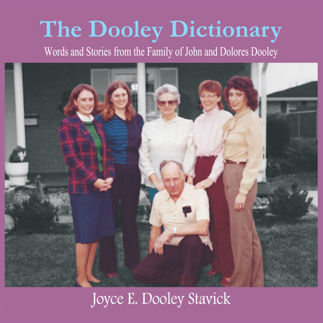 A family portrait on a book cover titled "The Dooley Dictionary" by Joyce E. Dooley Stavick.