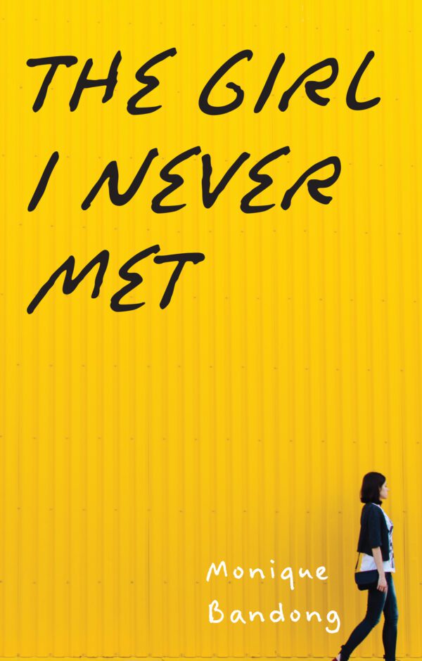 A woman walking past a yellow wall with the text "The Girl I Never Met: 2014 Young Writers Contest Winner" overlaying the image.