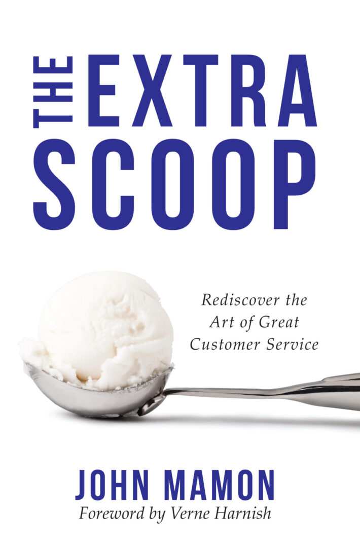 A book cover titled "The Extra Scoop: Rediscover the Art of Great Customer Service" by John Mamon with the subtitle "rediscover the art of great customer service," featuring an image of a single scoop of ice cream on a spoon.