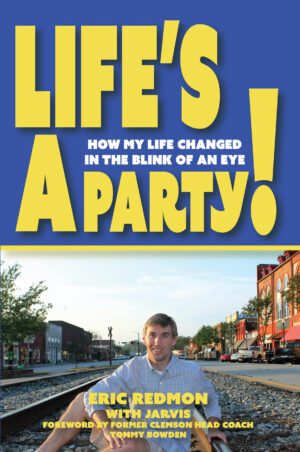 Book cover featuring a man seated on railroad tracks with a vibrant blue sky and buildings in the background, promoting "Life's a Party".