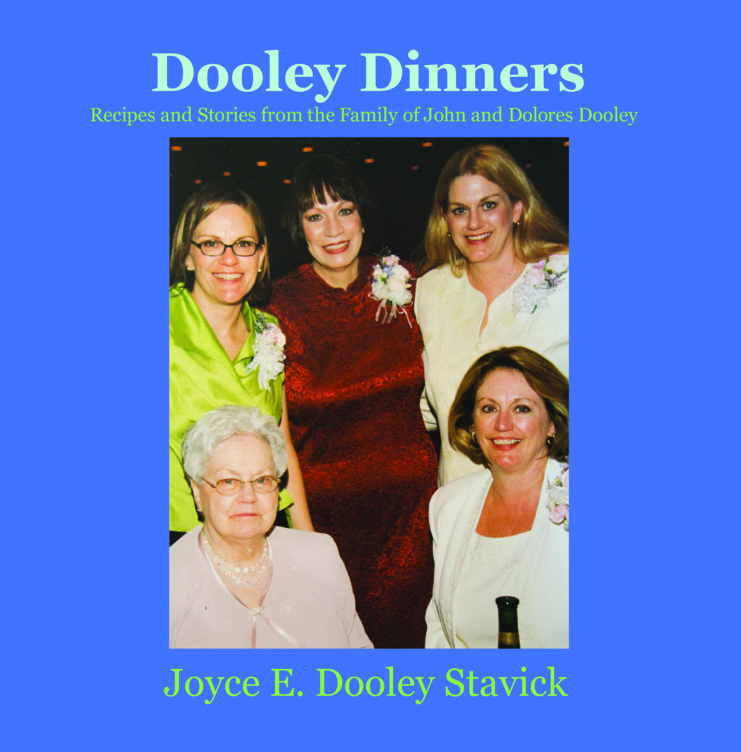 Cover of 'Dooley Dinners' featuring a family portrait and the author's name, Joyce E. Dooley Stavick.