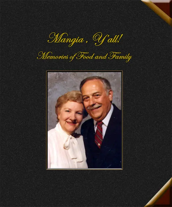 Smiling couple featured on a book cover titled 'Mangia Y'All memories of food and family.'.